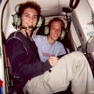 Justin Berfield taking off in a helicopter with Jason Felts