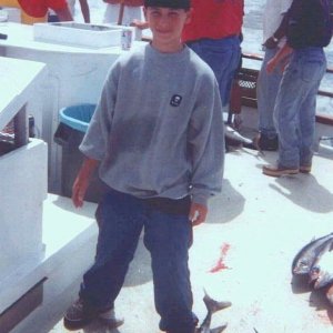 A young Justin fishing