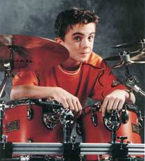 Frankie posing with his drum kit
