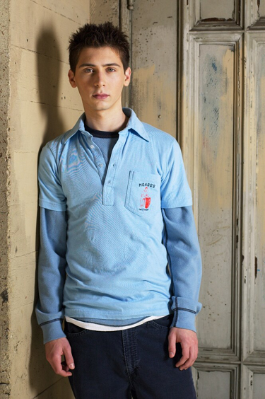 Justin Berfield posing: blue polo shirt 3